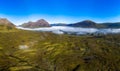 Panoramic aerial view of banks of fog in the valley of Glen Coe in the highlands of Scotland Royalty Free Stock Photo