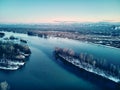 Panoramic aerial view: beautiful spring landscape: the Irtysh river in Kazakhstan wakes up from winter sleep - ice drift - snow Royalty Free Stock Photo