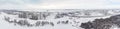 panoramic aerial view of city suburb area. winter cityscape on cloudy sky background. Royalty Free Stock Photo