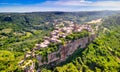 Panoramic aerial view of Civita di Bagnoregio from a flying drone around the medieval city, Italy