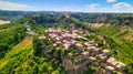 Panoramic aerial view of Civita di Bagnoregio from a flying drone around the medieval city, Italy