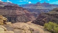 Panoramic aerial view of Colorado River weaving through valleys and rugged terrain seen from Plateau Point, Arizona, USA Royalty Free Stock Photo