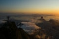 Panoramic, aerial view of Corcovado and Guanabara Bay during a beautiful, cloudy sunrise