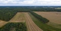 Aerial View of Rural Fields, Forests, and Distant Settlements Royalty Free Stock Photo