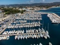 Panoramic aerial view on historical coastal Provencal city La Ciotat with large sailboat harbour and yacht shipyard, summer