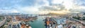 Panoramic aerial view of Hong Kong port industrial district, Stonecutters Bridge, and city on sunset skyline background Royalty Free Stock Photo