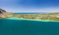 Panoramic aerial view of a huge freshwater lake surrounded by tall mountains Lake Kournas, Crete,Greece Royalty Free Stock Photo