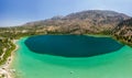 Panoramic aerial view of a huge freshwater lake surrounded by tall mountains Lake Kournas, Crete,Greece Royalty Free Stock Photo