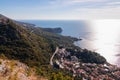 Panoramic aerial view of idyllic coastal town Sveti Stefan in the Bay of Budva, Adriatic Mediterranean Sea, Montenegro