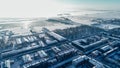 Panoramic aerial view of Kronstadt. Petrovskaya pier where the ships are. Coastline. Kotlin Island. Winter
