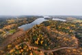 Panoramic aerial view of lake and colorful forests on a autumn day in Finland. Drone photography Royalty Free Stock Photo