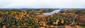 Panoramic aerial view of lake and colorful forests on a autumn day in Finland. Drone photography Royalty Free Stock Photo