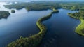 Panoramic aerial view of a lake among the forests. Landscape with drone. Royalty Free Stock Photo