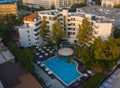Panoramic aerial view of large swimming pool with bar at luxury tropical hotel apartment resort. Rhodes, Greece, Europe Royalty Free Stock Photo