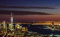 Panoramic and Aerial View of Manhattan, New York City at Night. Illuminated Buildings After Sunset. Beautiful Crimson Colors in th Royalty Free Stock Photo