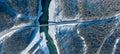 Panoramic aerial view nature and picturesque landscape near a Altay mountain with a green river Katun and bridge on a winter sunny