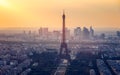 Panoramic aerial view of Paris, Eiffel Tower and La Defense business district. Aerial view of Paris at sunset. Panoramic view of Royalty Free Stock Photo