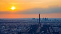 Panoramic aerial view of Paris, Eiffel Tower and La Defense business district. Aerial view of Paris at sunset. Panoramic view of Royalty Free Stock Photo