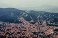 Panoramic aerial view of the red tiled roofs of the old town of Rasnov Romania