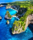 Panoramic aerial view at the sea and rocks. Blue water background from top view. Atuh beach, Nusa Penida, Bali, Indonesia.
