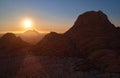 Panoramic, aerial view on a silhouette of a ancient Spitzkoppe mountain against sunset. Rocky desert landscape. Travelling to Royalty Free Stock Photo