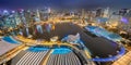 Panoramic Aerial view Singapore city skyline at night, Singapore , hotel and financial business building around Marina bay at Royalty Free Stock Photo