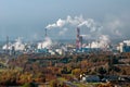 panoramic aerial view of the smoke of pipes as background of huge residential complex with high-rise buildings and private sector