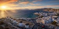 Panoramic aerial view to the beautiful windmills on Mykonos, Greece, during sunset Royalty Free Stock Photo