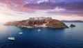 Panoramic aerial view to the villages of Oia during sunset time Royalty Free Stock Photo