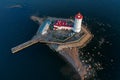 Panoramic aerial view of the Tolbukhin lighthouse. Artificial rocky island in the Gulf of Finland. The oldest Russian lighthouse.