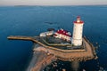 Panoramic aerial view of the Tolbukhin lighthouse. Artificial rocky island in the Gulf of Finland. The oldest Russian lighthouse.