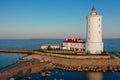 Panoramic aerial view of the Tolbukhin lighthouse. Artificial rocky island in the Gulf of Finland. The oldest Russian lighthouse.