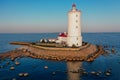 Panoramic aerial view of the Tolbukhin lighthouse. Artificial rocky island in the Gulf of Finland. The oldest Russian lighthouse.