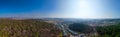 Panoramic aerial view of town and forest landscape.. Royalty Free Stock Photo