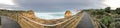 Panoramic aerial view of Twelve Apostles promenade on a cloudy winter sunrise, Australia Royalty Free Stock Photo