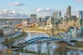 Panoramic aerial view of the Vilnius city with Viliya Neris river, bridge and modern urban skyline Royalty Free Stock Photo