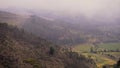 Panoramic Andes landscape view, with forest and cultivated fields, at dusk, Ecua