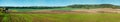 Big panoramic view of colored lines of fields