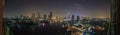 Panoramic areal view of the Bangkok skyline and Chao Pyraya river during nighttime