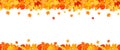 Panoramic autumn frame of orange and red falling leaves