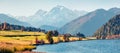 Panoramic autumn scene of Haidersee Lago della Muta lake with Ortler peak on background. Splendid morning view of Italian Alps,