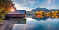 Panoramic autumn view of Altaussee village. Perfect evening scene of Altausseer lake with two ducks.