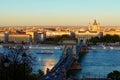 Panoramic autumn view of Budapest. Ancient Chain Bridge over Danube River. Sunset in the city Royalty Free Stock Photo