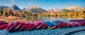 Panoramic autumn view of Strbske pleso lake. Picturesque evening scene of High Tatras National Park, Slovakia, Europe. Beauty of n