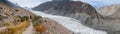 Panoramic autumn view of white Passu glacier. Royalty Free Stock Photo
