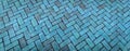 Panoramic backdrop in brick herringbone pattern in luminous blue shades, creative copy space