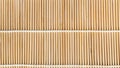 Panoramic background of mat from wooden sticks