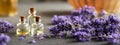 Horizontal header with aromatherapy essential oil bottles with blooming lavender Royalty Free Stock Photo