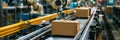 Panoramic banner of robot arm in industrial warehouse packing station shipping cartboard box Royalty Free Stock Photo
