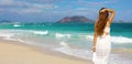 Panoramic banner view of young beautiful woman on paradise tropical beach of Fuerteventura, Canary Islands